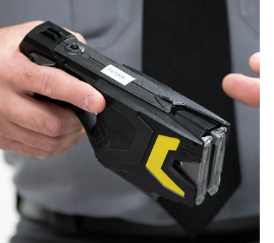 Man holding TASER X2